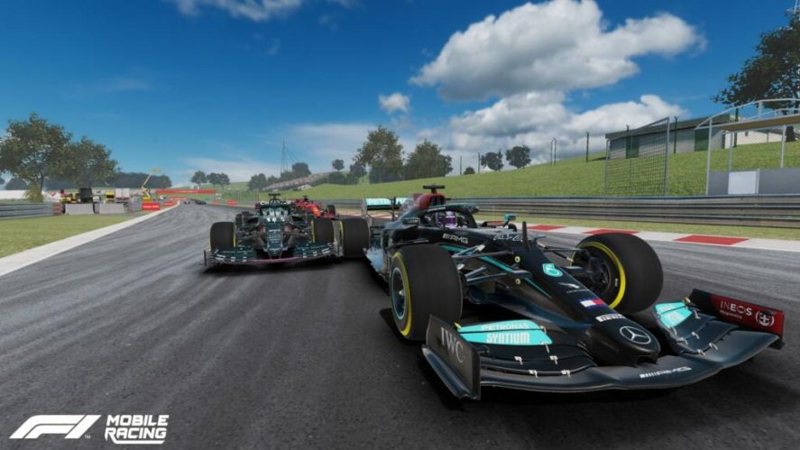 F1 Mobile Racing in-game screenshot with one Formula 1 car overtaking another