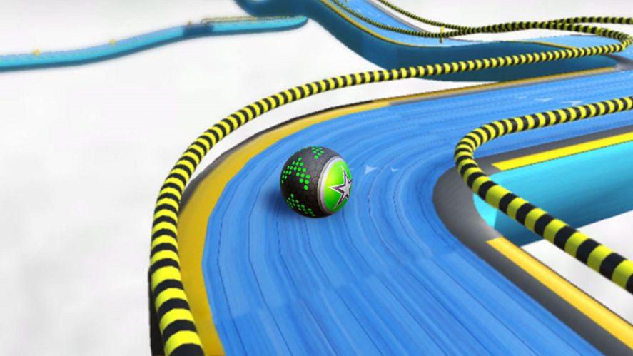 Going Balls in-game screenshot showing a ball decorated with a green star rolling down a blue track