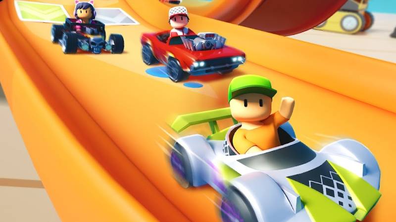 Three Stumble Guys characters driving in a circuit.