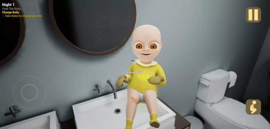 Baby in yellow at a bathroom sink